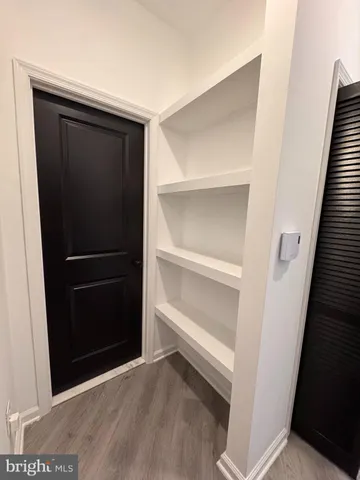 a view of an empty walk in closet