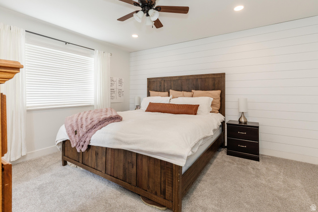 972 West 2840th Street South Logan, UT 84321 - Photo 12 of 46 Bedroom featuring a wood-finish bed frame, shiplap accent wall, recessed lighting, and a ceiling fan