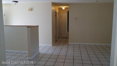 4580 Alfred Street Cocoa, FL 32927 - Photo 9 of 14 hall leading to two bedroom & bath