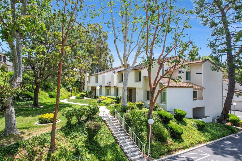 255 Scenic Way Brea, CA 92821 - Photo 2 of 57 a front view of a house with garden