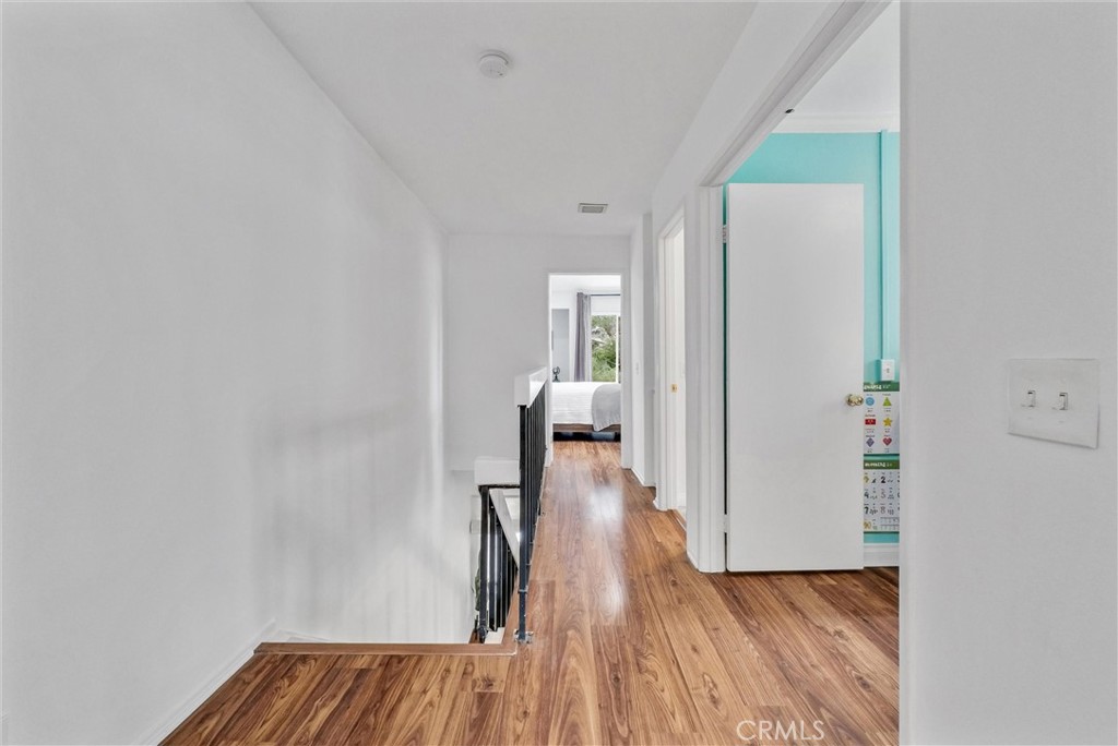 255 Scenic Way Brea, CA 92821 - Photo 25 of 57 a view of hallway with wooden floor