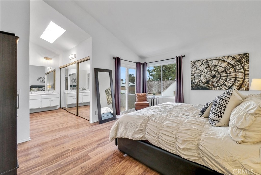 255 Scenic Way Brea, CA 92821 - Photo 26 of 57 a bedroom with a large bed and a view of kitchen