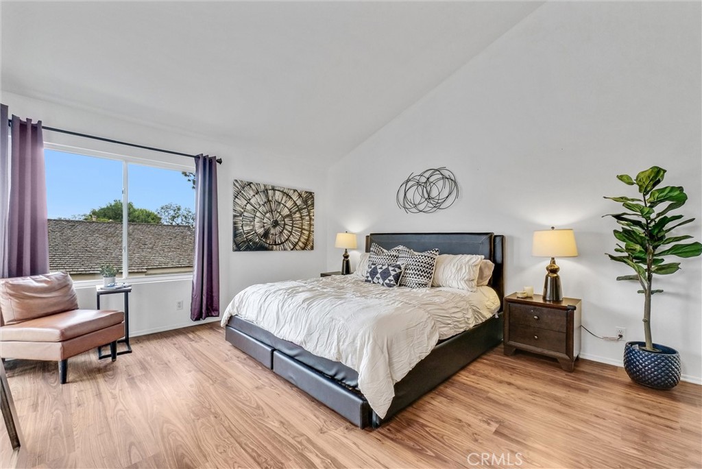 255 Scenic Way Brea, CA 92821 - Photo 27 of 57 a bedroom with a bed and a couch