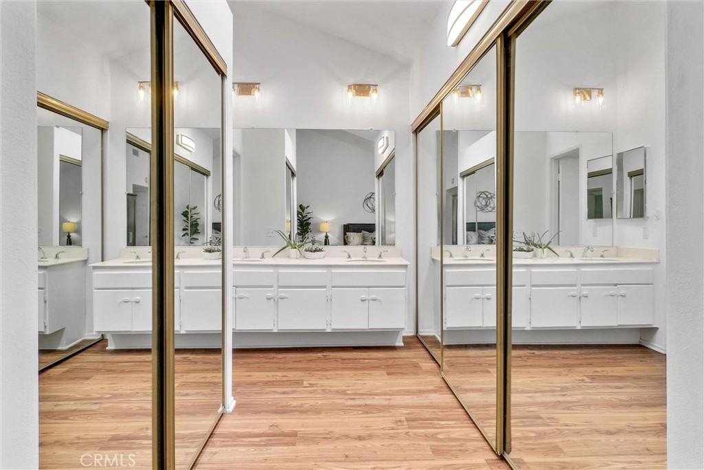 255 Scenic Way Brea, CA 92821 - Photo 29 of 57 a bathroom with a sink and a mirror