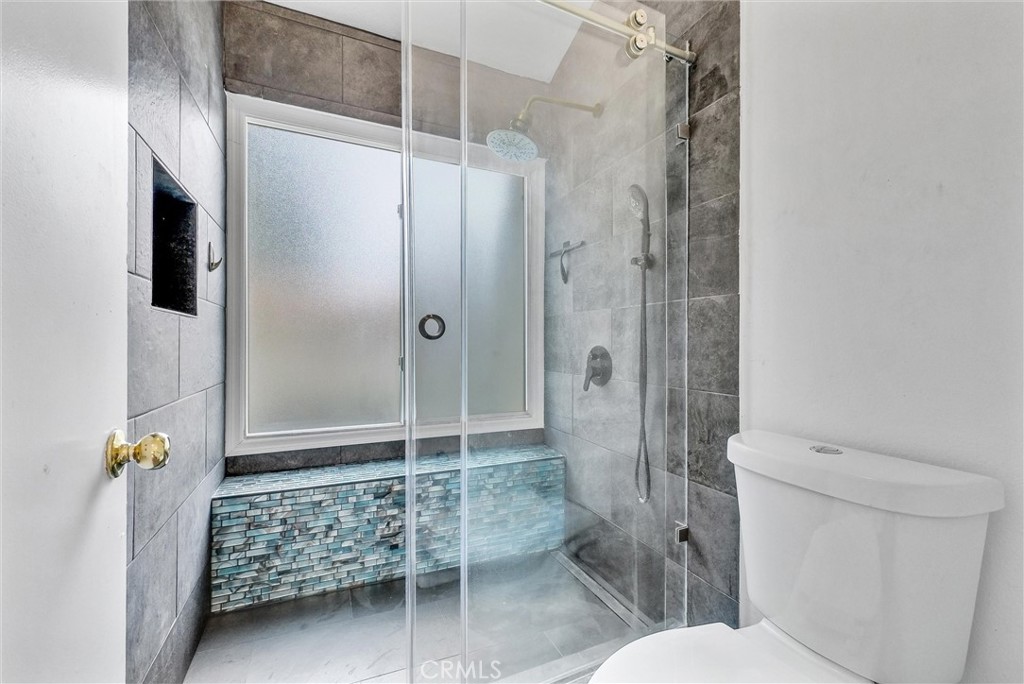 255 Scenic Way Brea, CA 92821 - Photo 31 of 57 a bathroom with a shower and a toilet