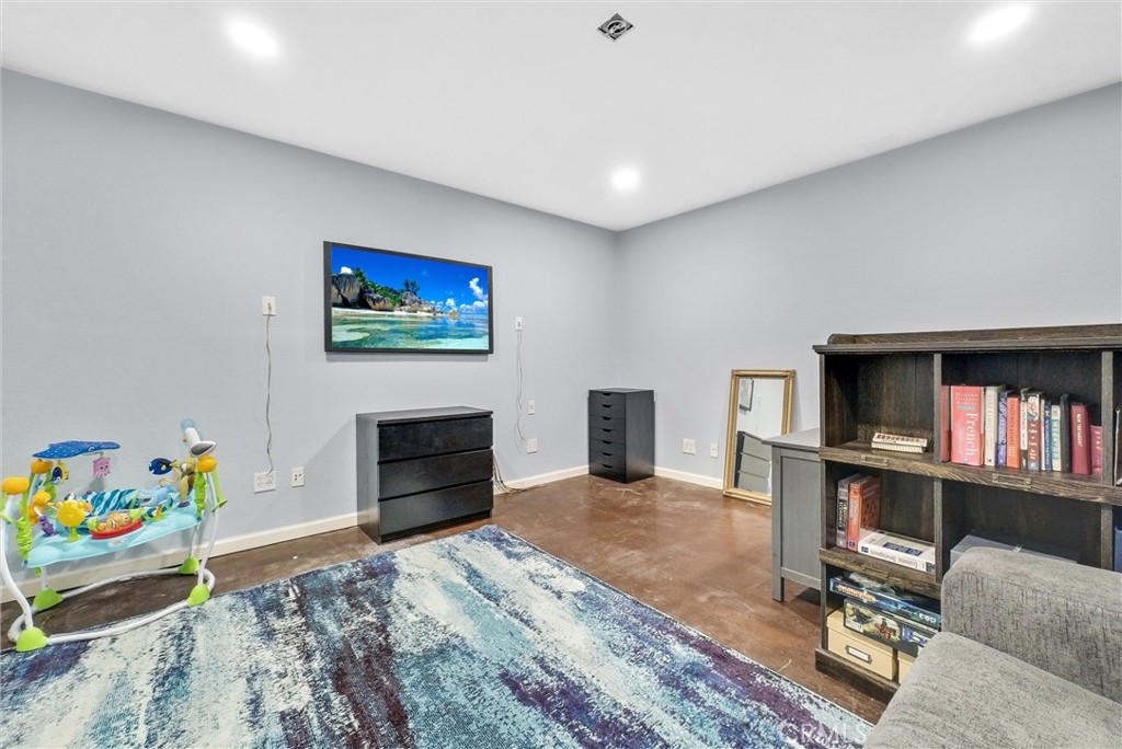 255 Scenic Way Brea, CA 92821 - Photo 41 of 57 a bedroom with furniture and a fireplace