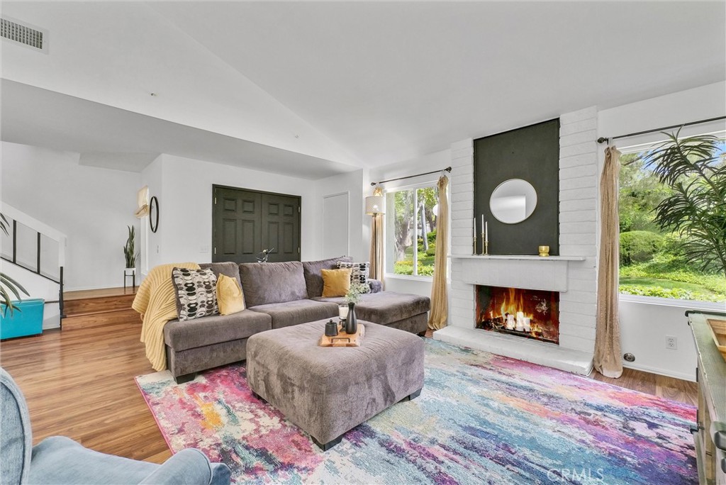 255 Scenic Way Brea, CA 92821 - Photo 6 of 57 a living room with furniture and a fireplace