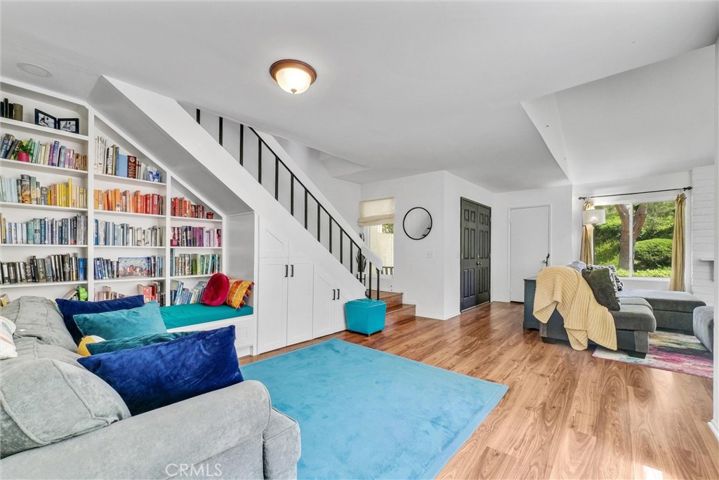 255 Scenic Way Brea, CA 92821 - Photo 8 of 57 a living room with furniture and a wooden floor