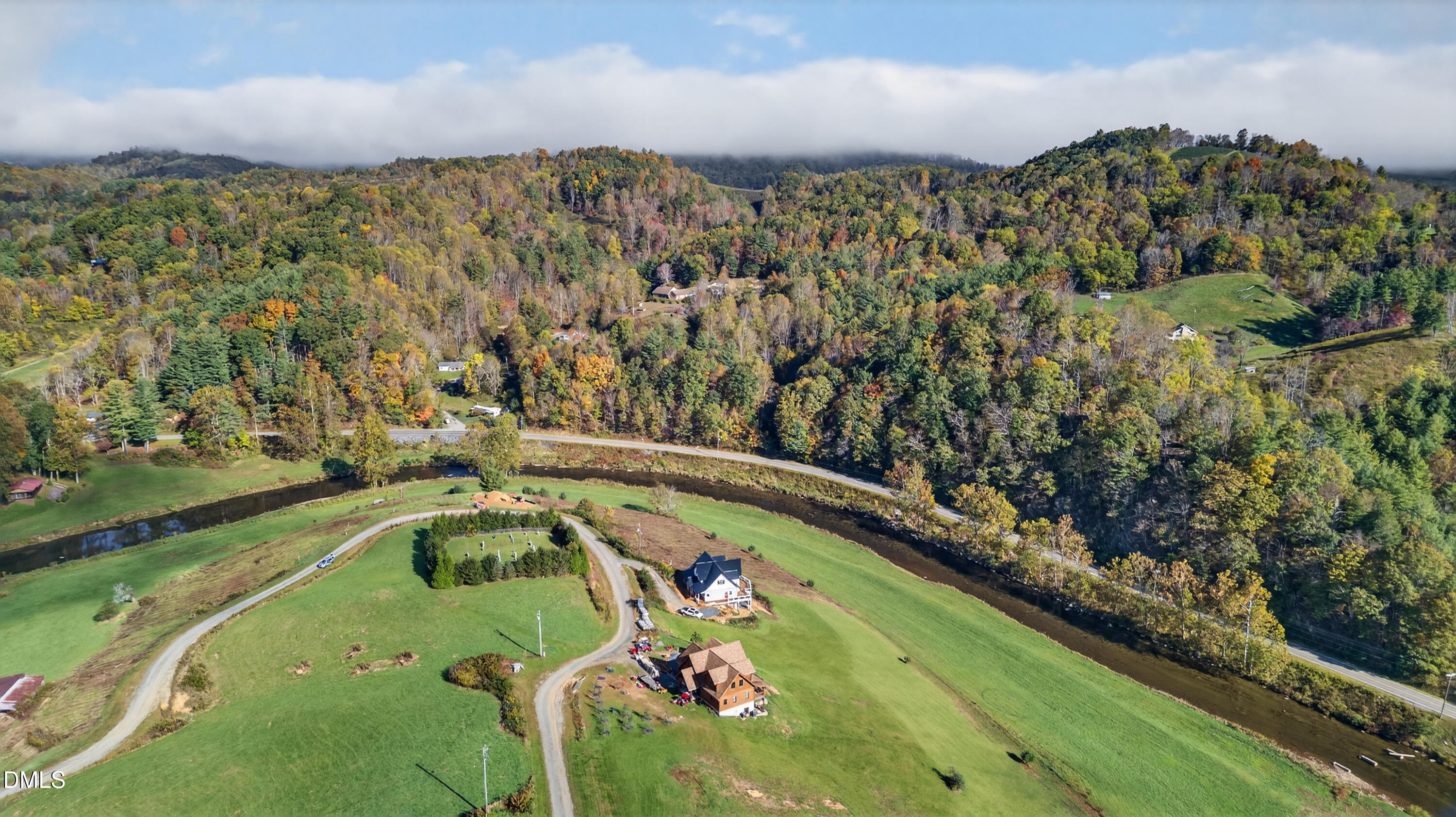 262 River Landing Way Warrensville, NC 28693 - Photo 11 of 25 a view of a swimming pool with a yard