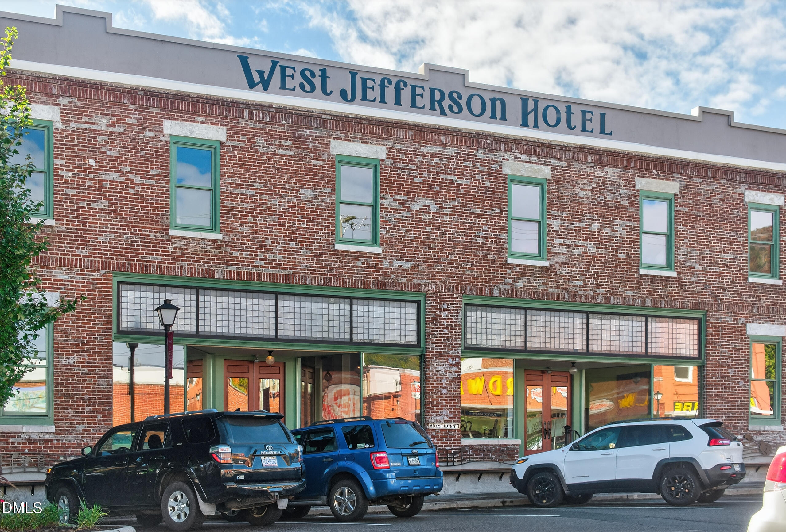 262 River Landing Way Warrensville, NC 28693 - Photo 14 of 25 a car parked in front of a building