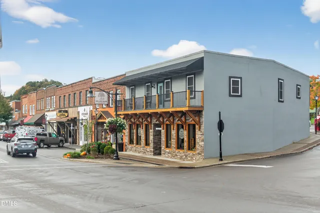 a view of a building with a street
