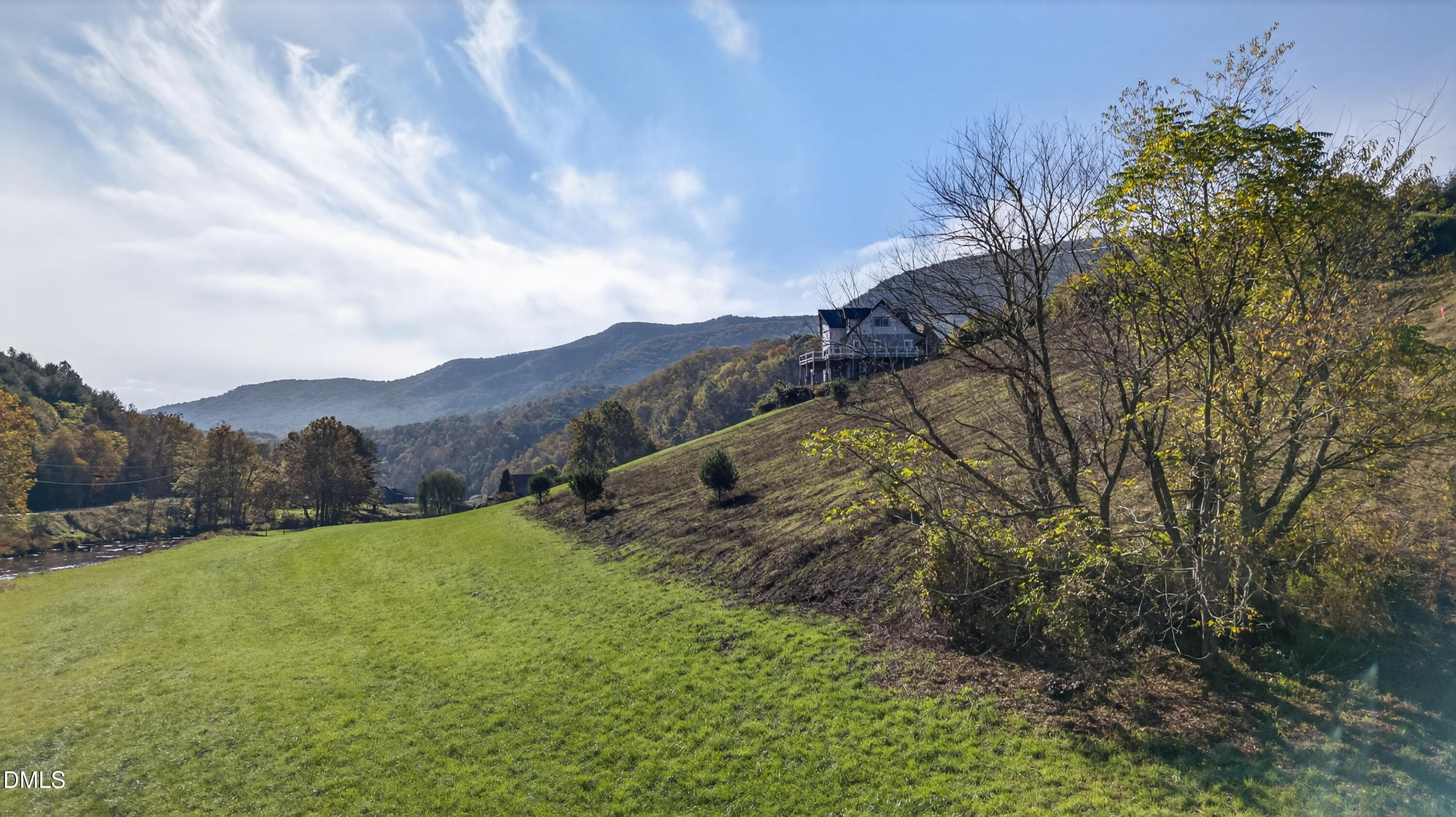 262 River Landing Way Warrensville, NC 28693 - Photo 20 of 25 a view of an outdoor space with mountain view