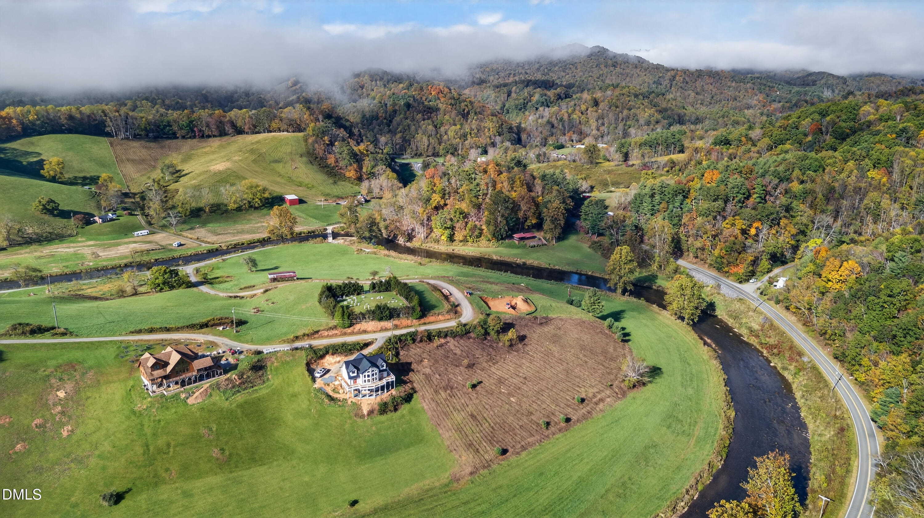 262 River Landing Way Warrensville, NC 28693 - Photo 21 of 25 an aerial view of a house with a yard basket ball court