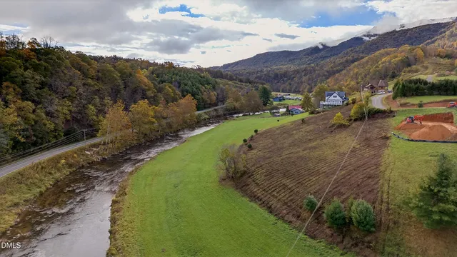 a view of a road with a yard