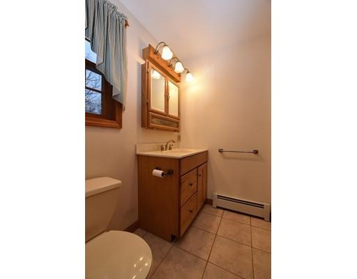 190 Old Gilbertville Road Ware, MA 01082 - Photo 20 of 30 a bathroom with a toilet sink and mirror