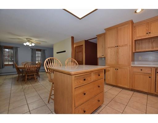 190 Old Gilbertville Road Ware, MA 01082 - Photo 6 of 30 a kitchen with cabinets and chairs