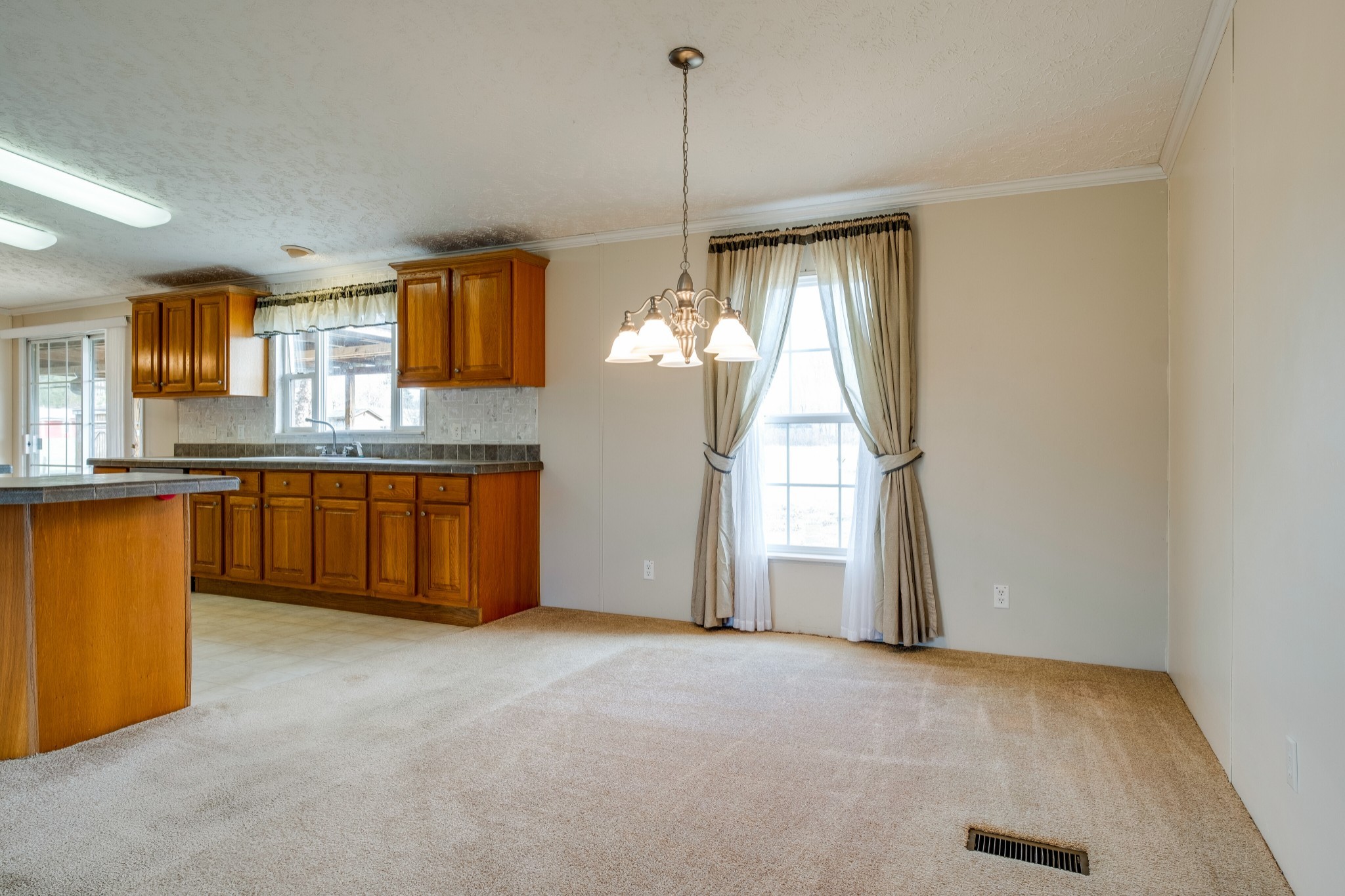 131 Blue Well Road Lebanon, TN 37090 - Photo 8 of 32 a view of a kitchen with a sink and dishwasher cabinet