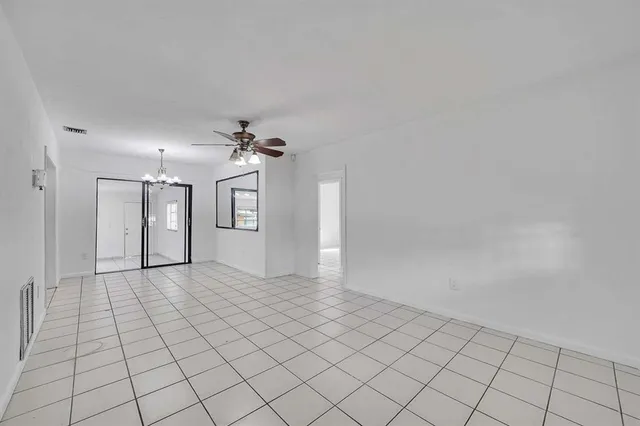 a view of an empty room and window