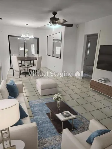 a bathroom with a sink mirror and a shower