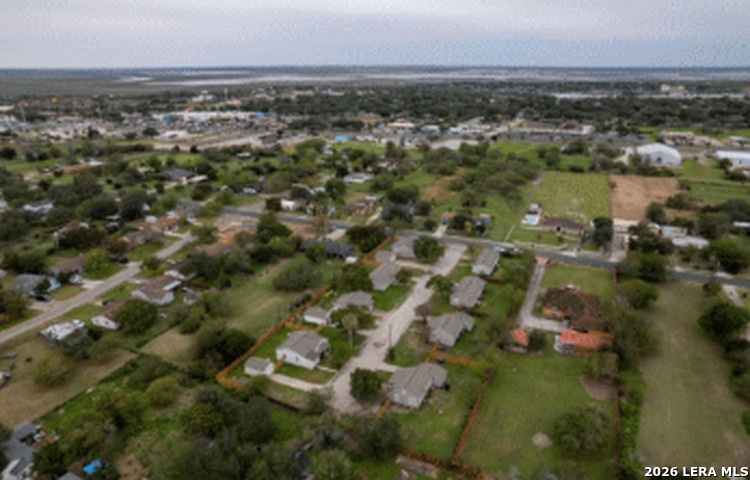 10901 Annaville Road Corpus Christi, TX 78410 - Photo 4 of 11 an aerial view of residential building with parking and yard