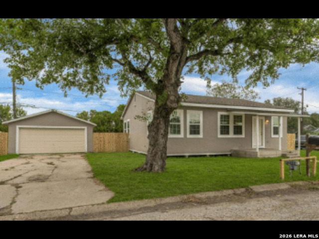 10901 Annaville Road Corpus Christi, TX 78410 - Photo 6 of 11 a front view of a house with a garden and yard