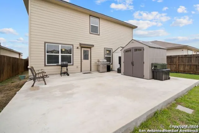a view of a house with a patio