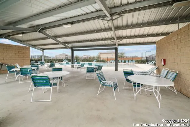 a room with lots of furniture and view