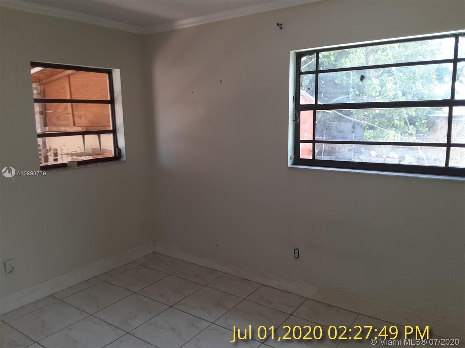 3530 Southwest 104th Avenue Miami, FL 33165 - Photo 12 of 29 an empty room with a window