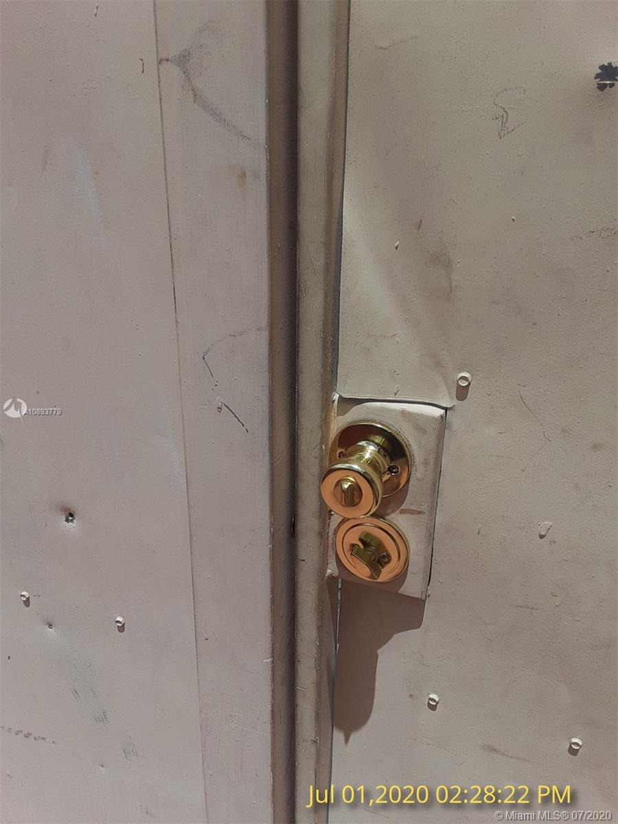 3530 Southwest 104th Avenue Miami, FL 33165 - Photo 14 of 29 a close view of door lock