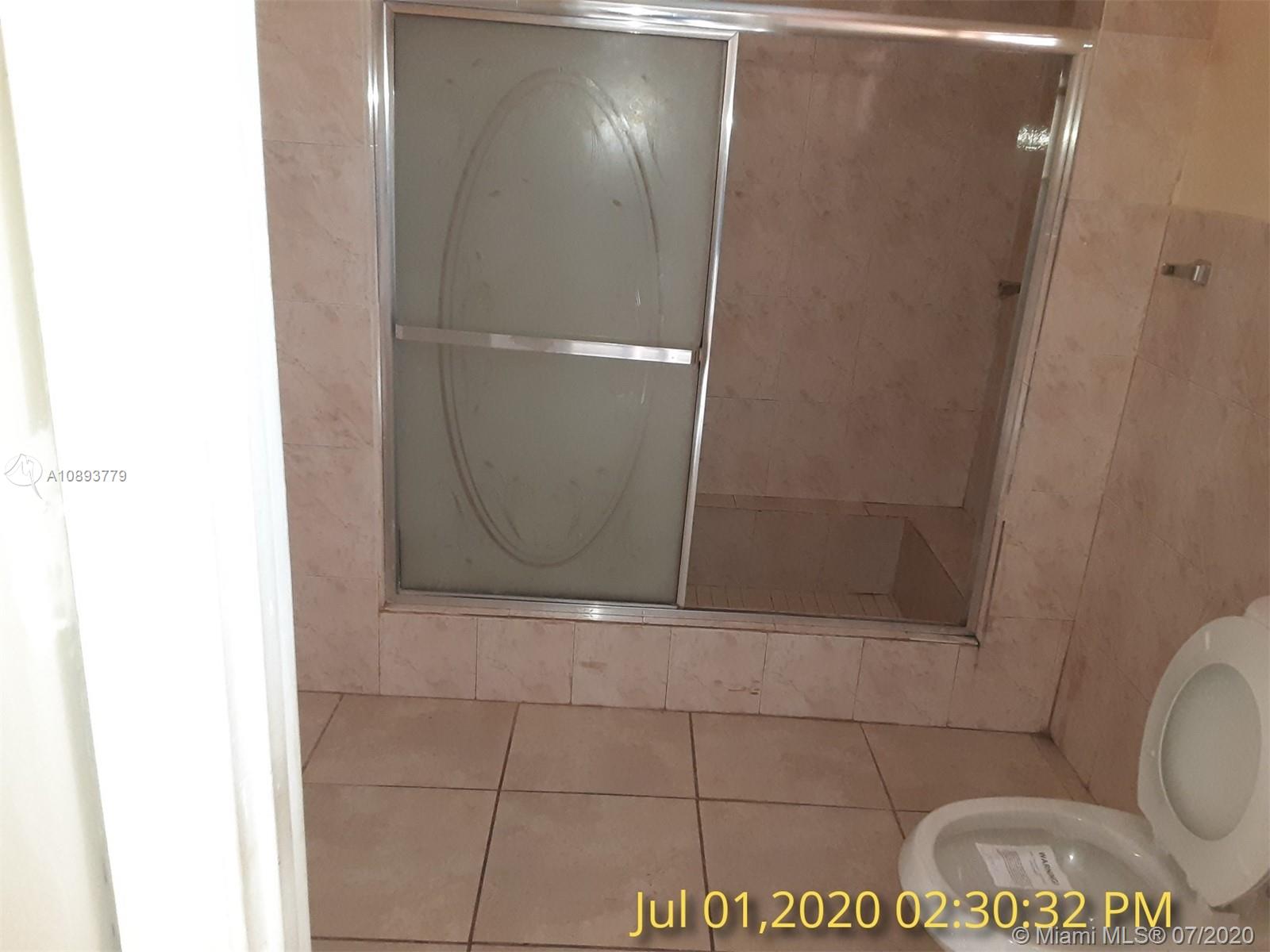 3530 Southwest 104th Avenue Miami, FL 33165 - Photo 22 of 29 a bathroom with a mirror