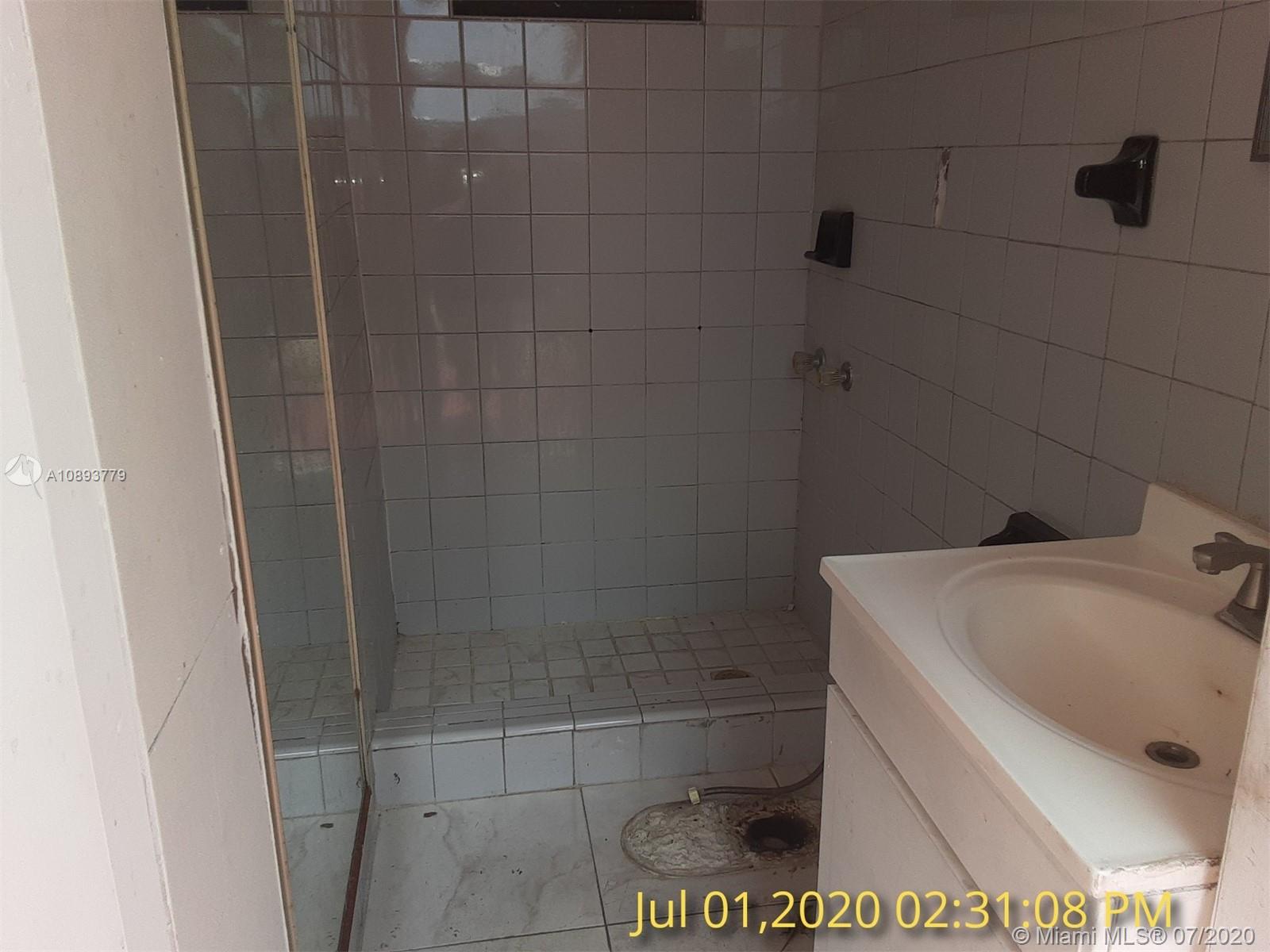 3530 Southwest 104th Avenue Miami, FL 33165 - Photo 23 of 29 a bathroom with a sink and toilet