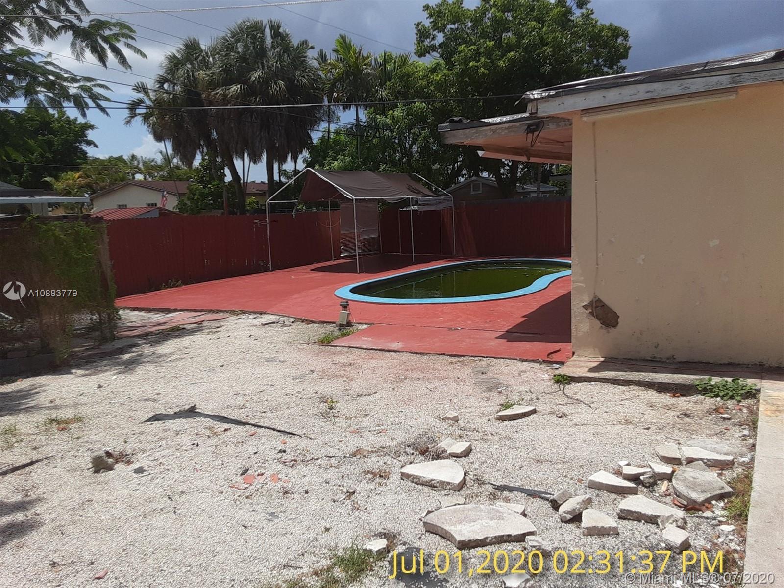 3530 Southwest 104th Avenue Miami, FL 33165 - Photo 26 of 29 a view of a backyard with plants