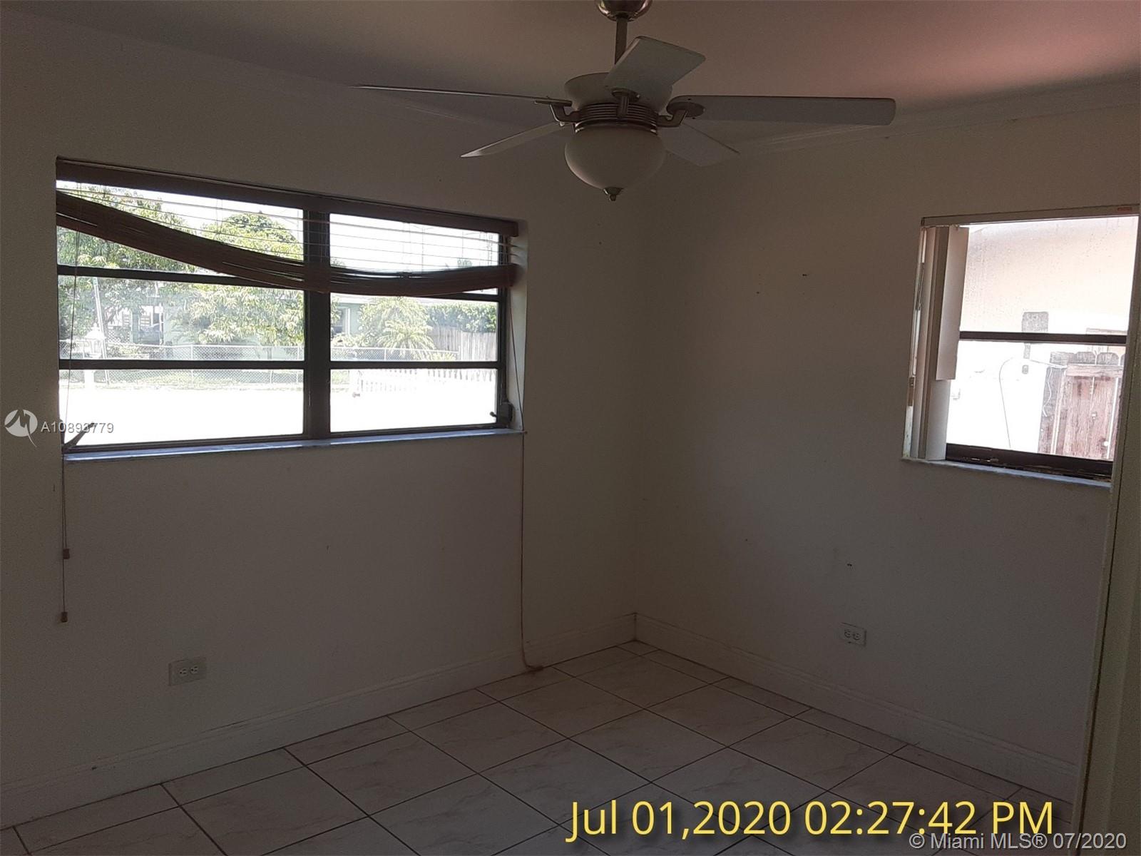 3530 Southwest 104th Avenue Miami, FL 33165 - Photo 10 of 29 an empty room with a window