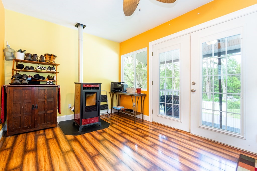 7 Braley Road Freetown, MA 02717 - Photo 8 of 42 a view of living room with furniture and floor to ceiling windows