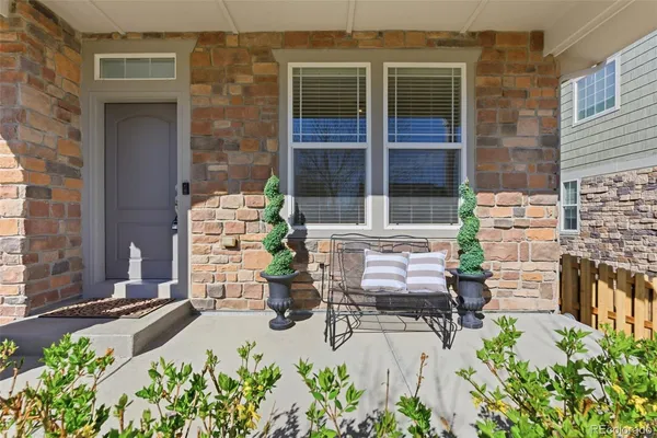 front view of house with outdoor seating