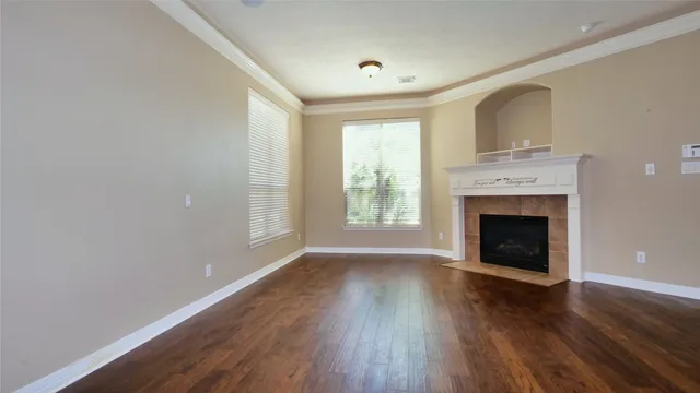 a kitchen with granite countertop a sink a counter space cabinets and stainless steel appliances