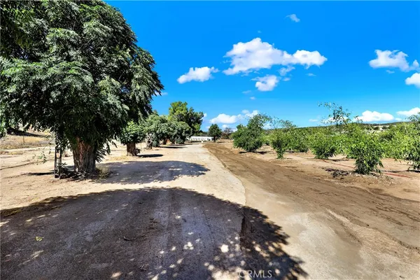 a view of a chairs and tables in patio
