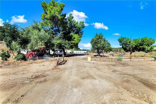 a view of street with parked cars