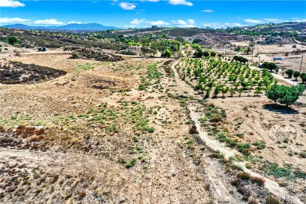 a view of a street with a building in the background