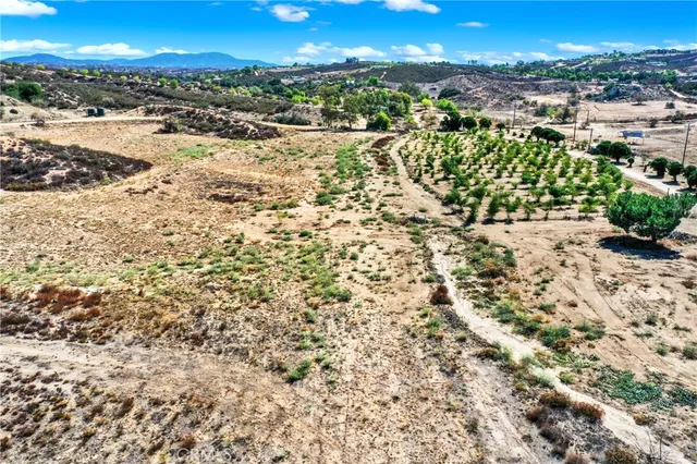 a view of a street with a building in the background