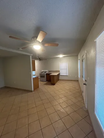 a view of a livingroom with a furniture