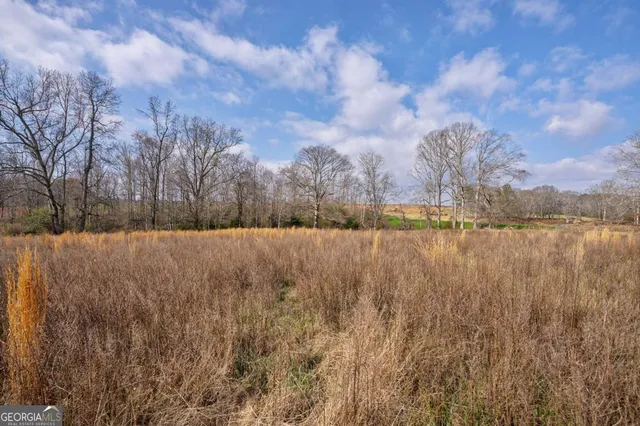 a view of lake with outdoor space