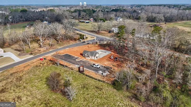 front view of a house with a fountain