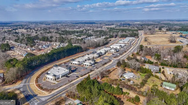 a view of a backyard with water fountain