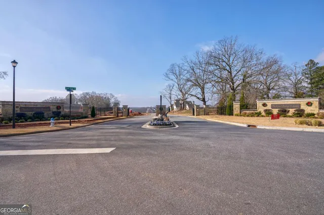 a view of street with large trees