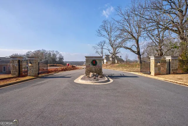 a vase with trees in front of it