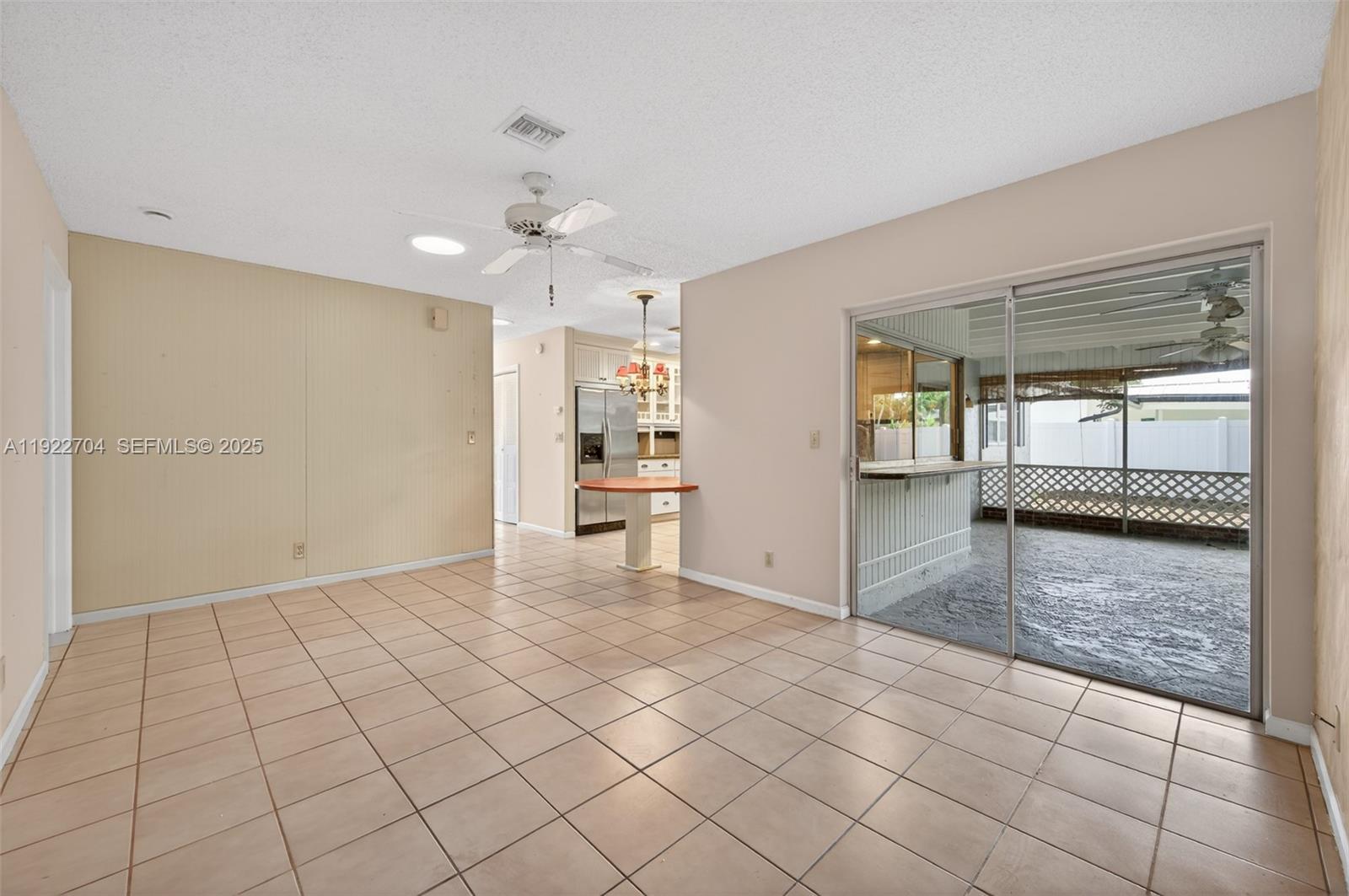 969 Northwest 8th Street Boca Raton, FL 33486 - Photo 14 of 38 an empty room with cabinet and mirrors