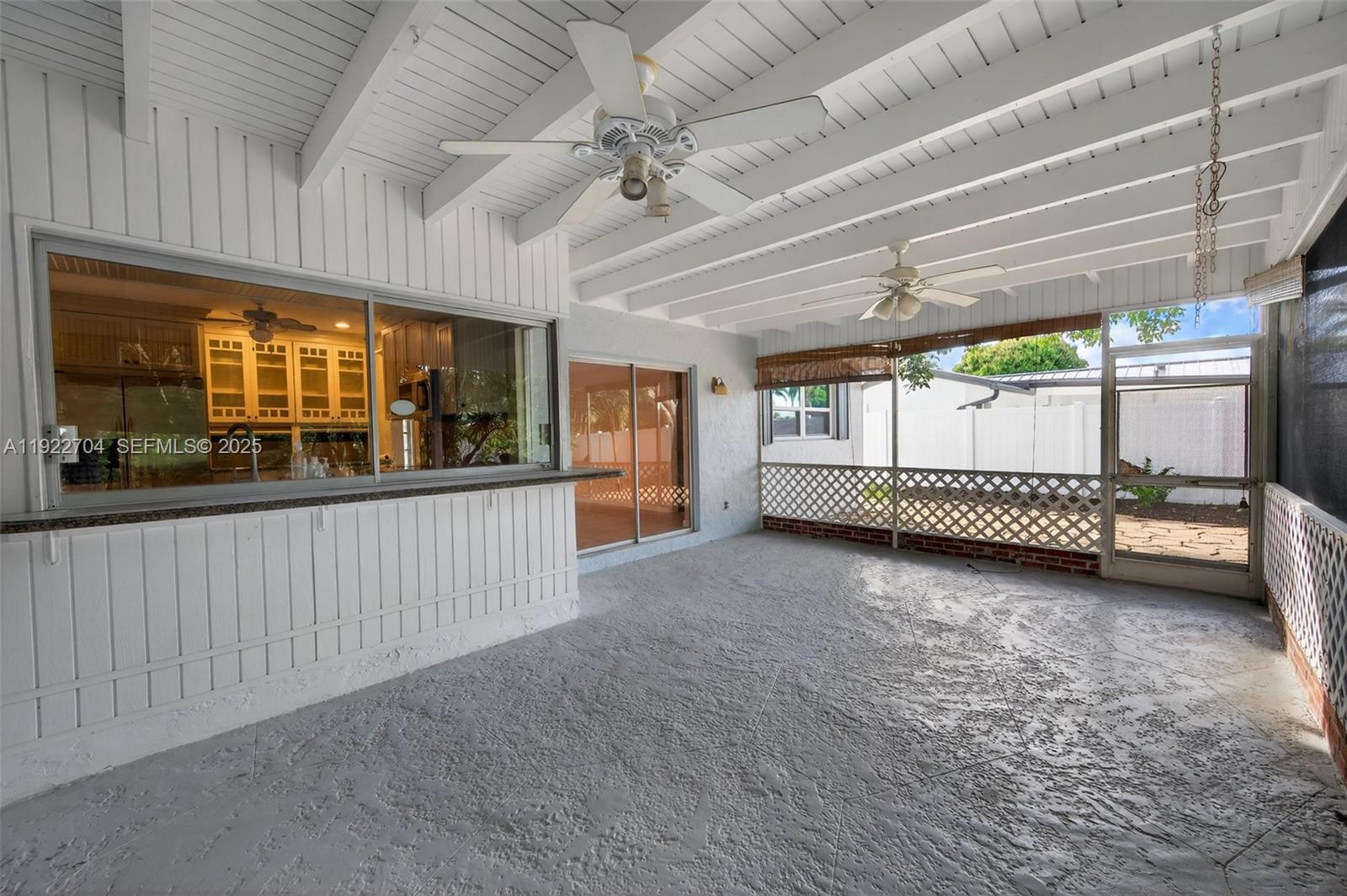 969 Northwest 8th Street Boca Raton, FL 33486 - Photo 27 of 38 a view of an empty room with a window