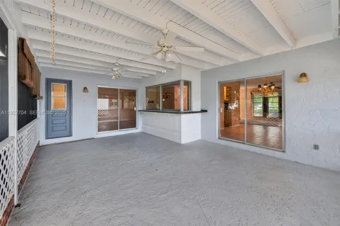 en empty room with windows