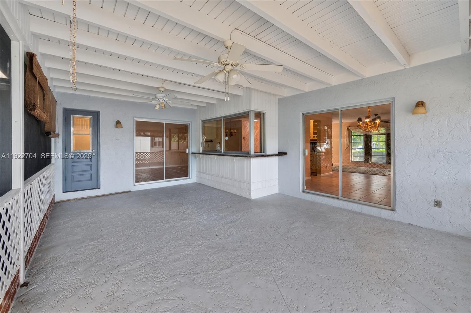 969 Northwest 8th Street Boca Raton, FL 33486 - Photo 29 of 38 en empty room with windows